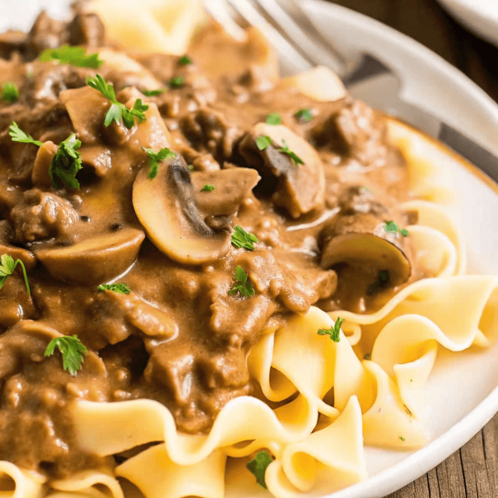 Delicious plate of Hamburger Stroganoff with creamy sauce and noodles