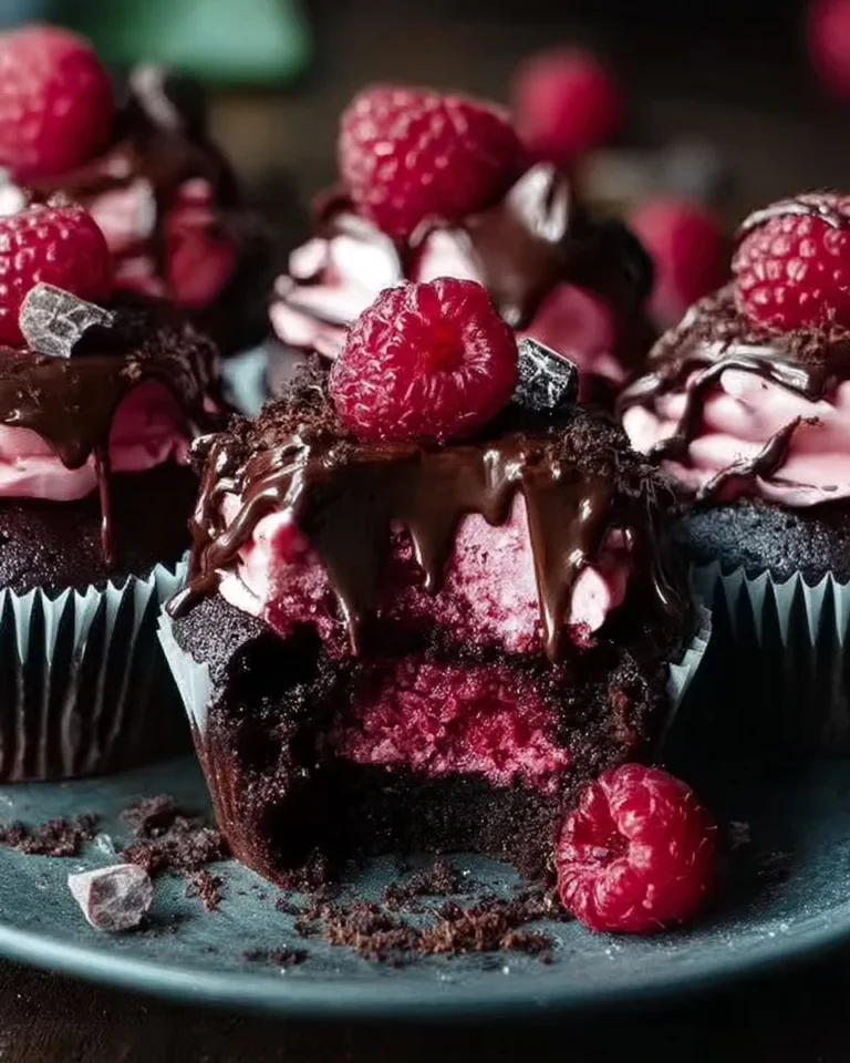 Raspberry Chocolate Lava Cupcakes with gooey chocolate and raspberry filling