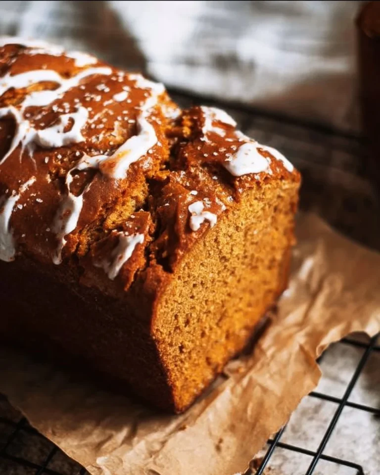 Homemade sweet potato bread topped with fluffy marshmallow meringue