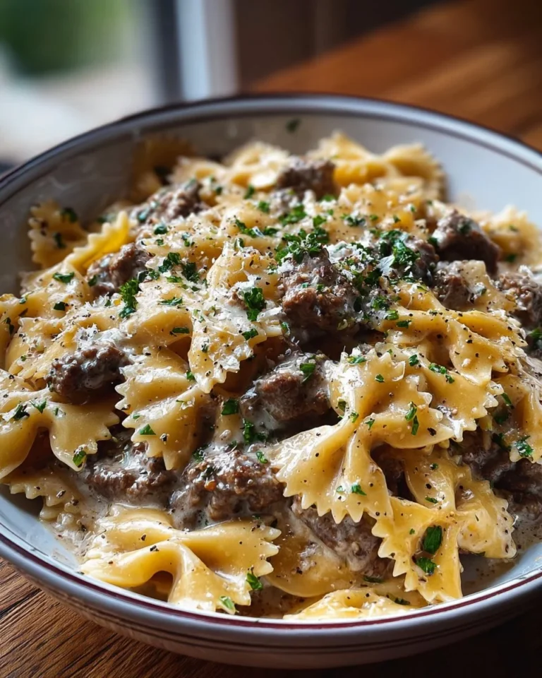 Creamy Parmesan Garlic Beef Bowtie Pasta served in a bowl